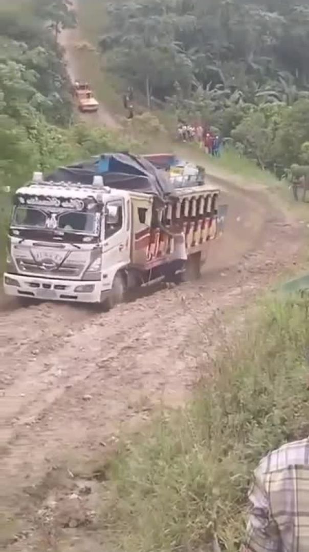 Heavy truck smashed an Asian man during an accident